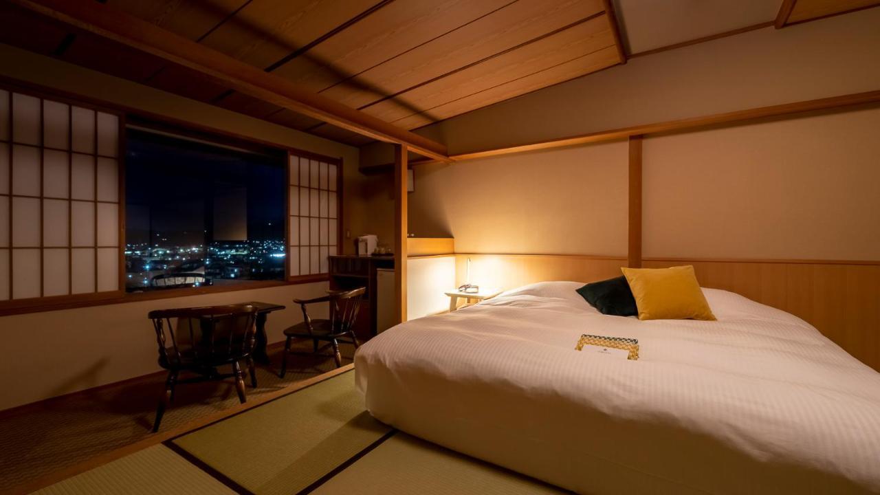 Onsen Hotel Omoto Мацумото Экстерьер фото