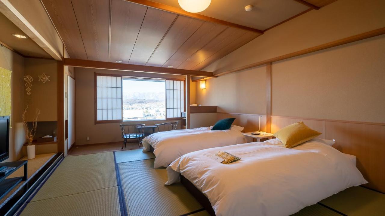 Onsen Hotel Omoto Мацумото Экстерьер фото